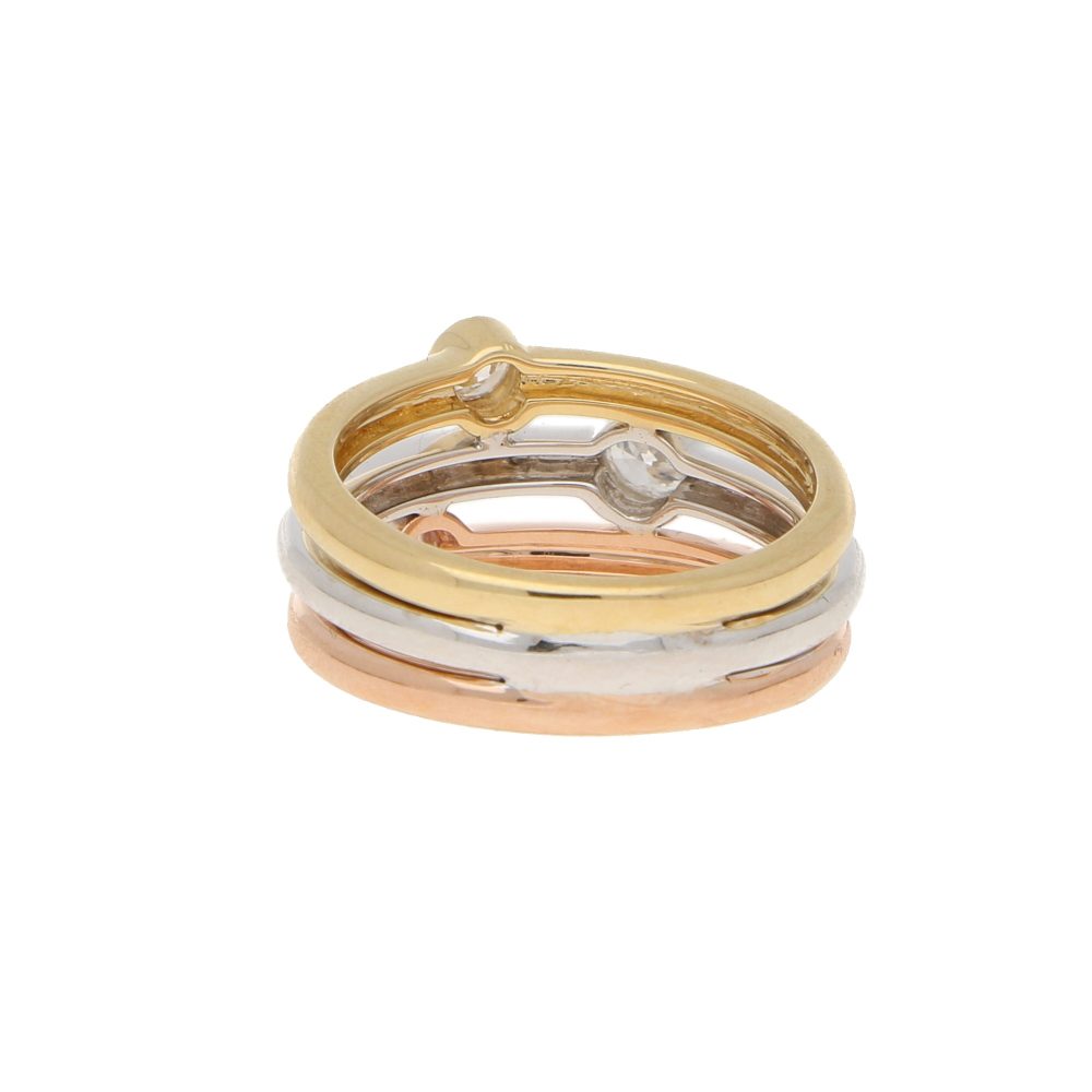 Diamond triple ring set in yellow, white and rose gold.