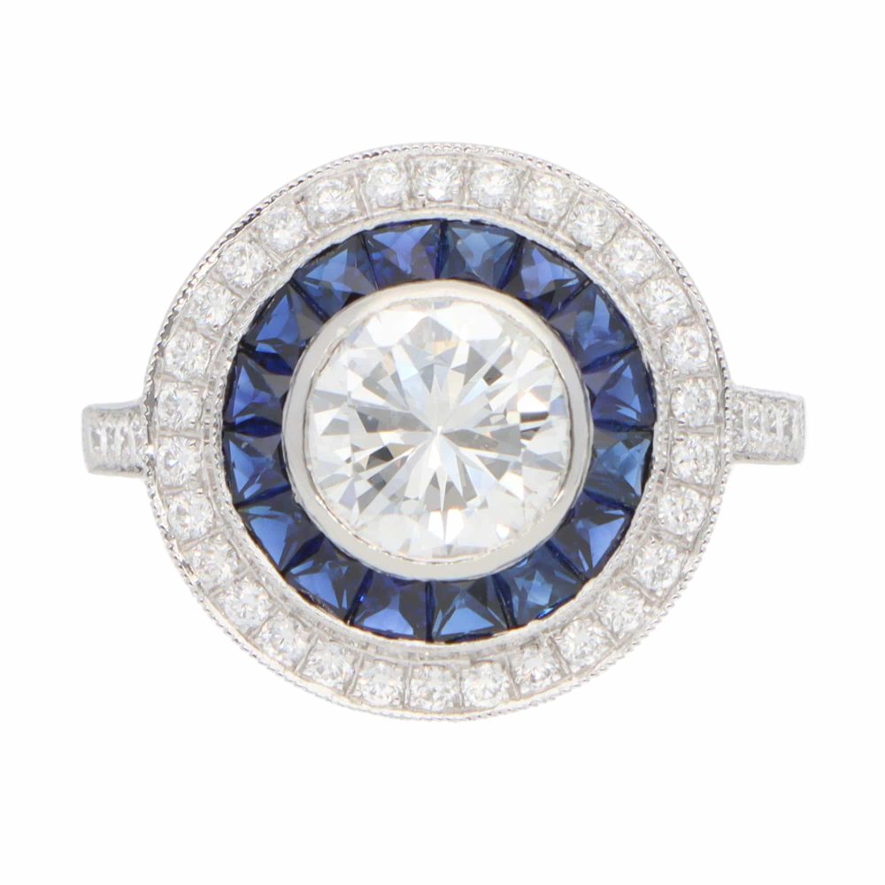 Diamond and sapphire target ring in platinum.