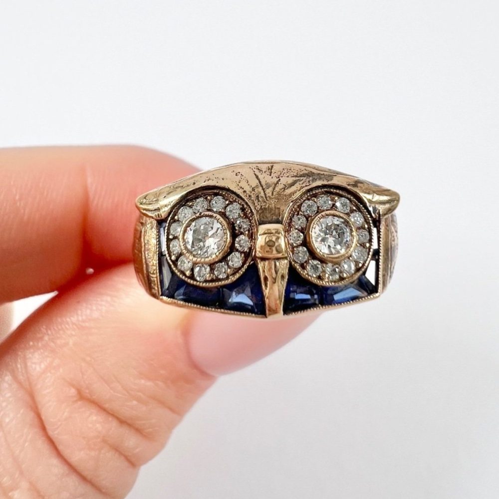 Vintage owl cocktail ring in rose gold with diamonds and sapphires.