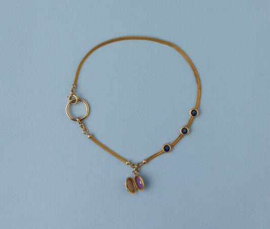 Antique Victorian Forget-Me-Not and 18ct Yellow Gold Locket Chain Pendant Necklace; 18ct yellow gold woven watch chain with three slides and a locket with two compartments decorated with forget-me-nots on both sides. France, 19th century