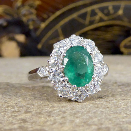 1.30ct Emerald and Diamond Cluster Ring in Platinum