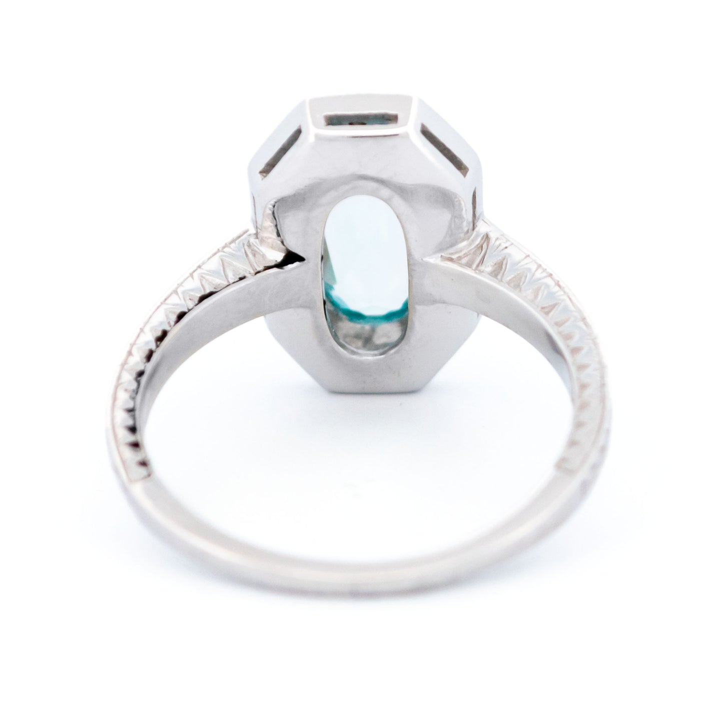 An oval blue topaz and diamond dress ring in white gold