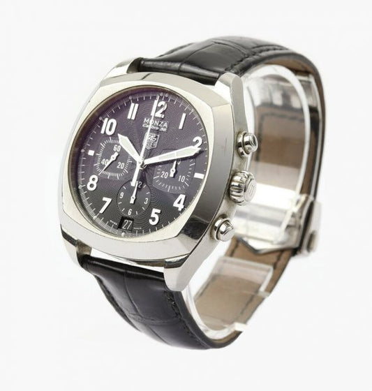 Tag Heuer Monza 38mm Steel Automatic Chronograph; Ref. CR5110, black dial with Arabic numerals, calibre 36 movement visible through the display back, on a TAG Heuer black leather strap with stainless steel push-button deployment buckle.