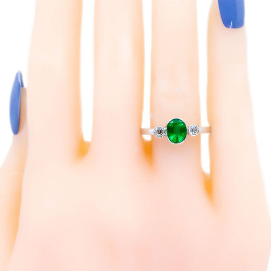 Vintage 14 Carat White Gold Oval Emerald and Old Mine-Cut Diamond Three Stone Ring