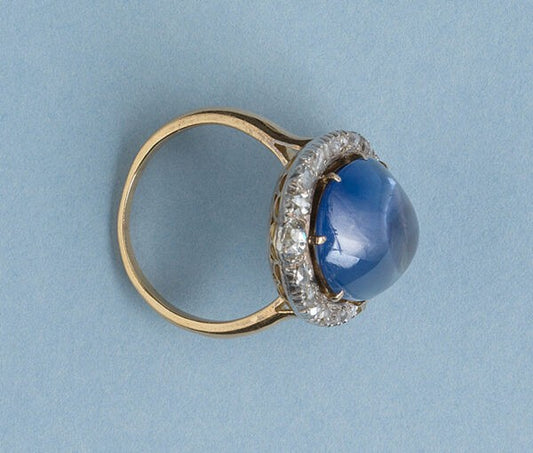Antique Edwardian 16ct Cabochon Cut Sapphire and Rose-Cut Diamond Oval Cluster Ring;