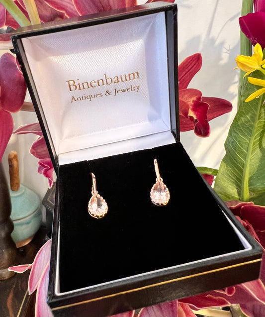 A pair of pear shaped morganite drop earrings in yellow gold, in a box
