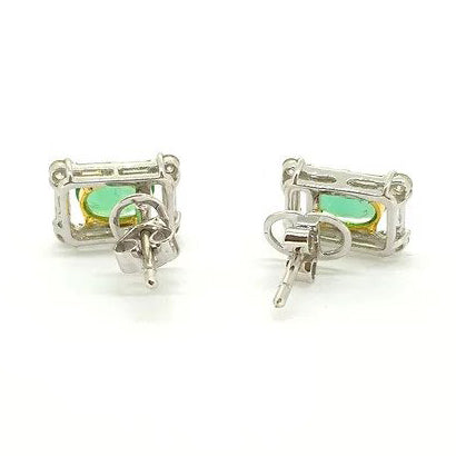 Contemporary Brilliant and Baguette Diamond and Emerald Cluster Earrings