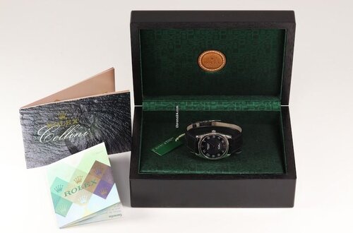 Rolex Cellini 4233 Wrist Watch; 18ct white gold case, black dial, Arabic numerals, manual winding movement, on black leather strap with 18ct white gold buckle, Circa 2008, with Rolex box and papers