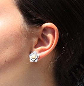 Diamond, Pearl and Enamel Lotus Flower Stud Earrings; pearl surrounded by diamond set leaves, enamel detailing, 14ct gold. Steltman, Netherlands, 2004