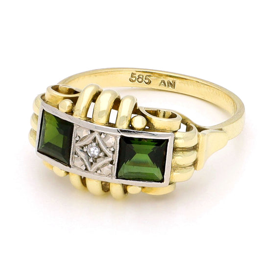 Square green tourmaline and round diamond ring in yellow and white gold, stamped 585, against a white background