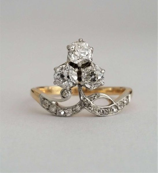 Antique Edwardian Old Cut Diamond Trefoil Cluster Ring; 'Duchesse' ring, with three old cut diamonds, 0.20cts each, rose-cut diamond accents