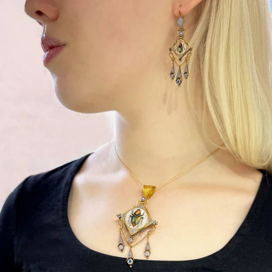 Antique Italian Micromosaic and Gold Pendant Brooch Earrings Suite, decorated with micromosaic fly beetle on blue red and white background in yellow gold with granulated Etruscan style work. Circa 1870. Comes in a Marchesini, Firenze Roma, fitted case