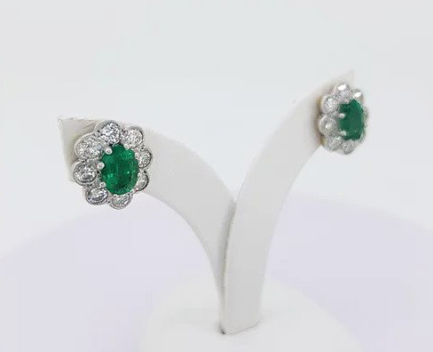 Emerald and Diamond Oval Cluster Stud Earrings; featuring 1.50cts oval emeralds surrounded by 1.30cts diamonds, in 18ct white and yellow gold