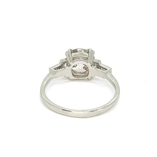 2.16ct Diamond Solitaire Engagement ring, baguette-cut diamond set shoulders, mounted in platinum