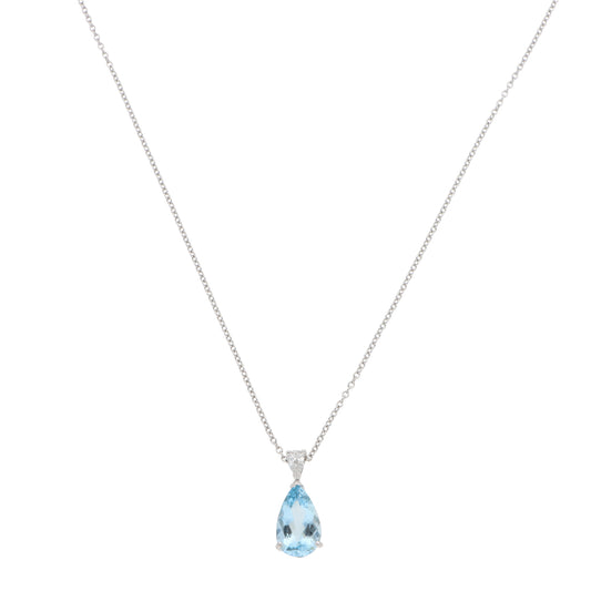 A pear shaped aquamarine and diamond pendant on a white gold chain, on a white background