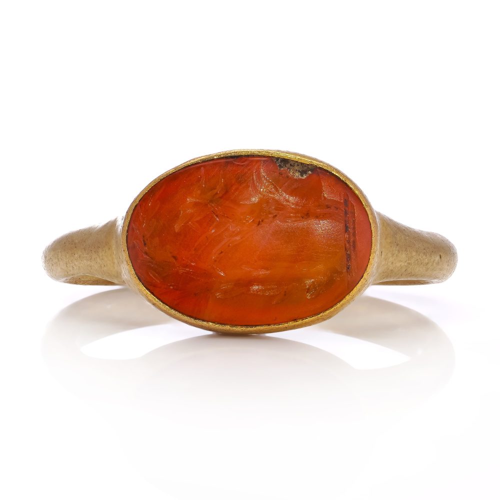 Roman carnelian intaglio ring set in 22 ct yellow gold, circa 100 - 300 AD.