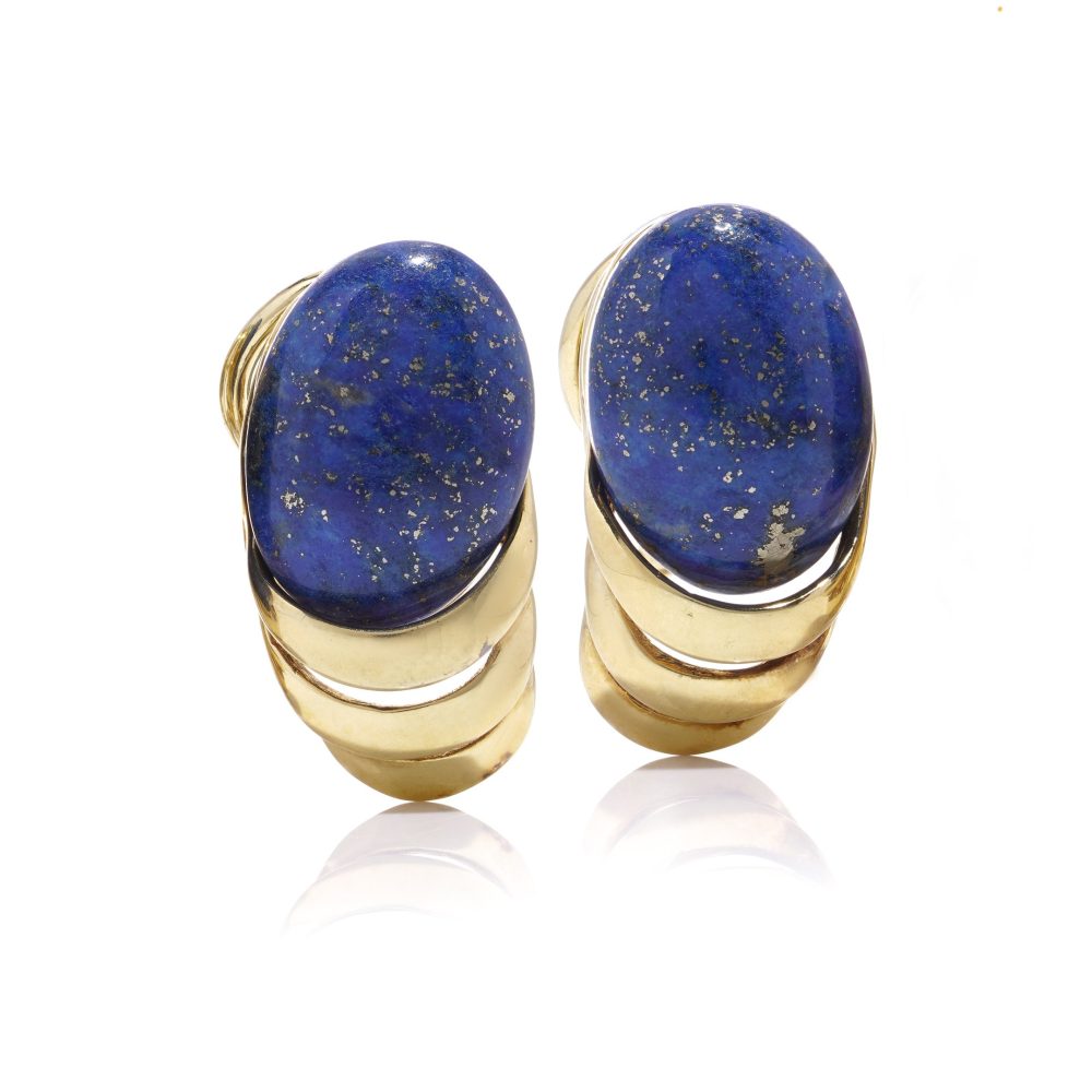 Vintage gold clip-on stud earrings with lapis lazuli stones.