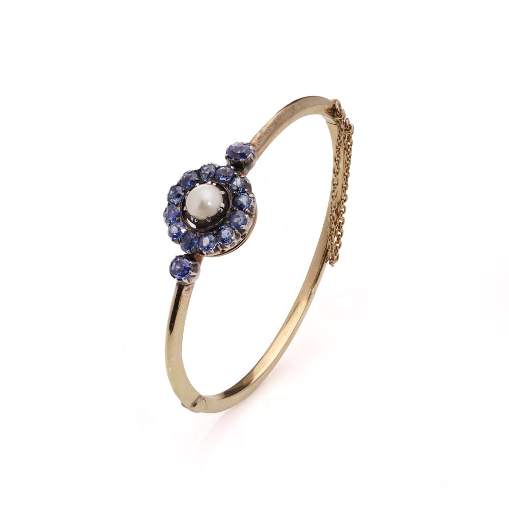 Victorian gold and silver sapphire cluster bangle with natural pearl.