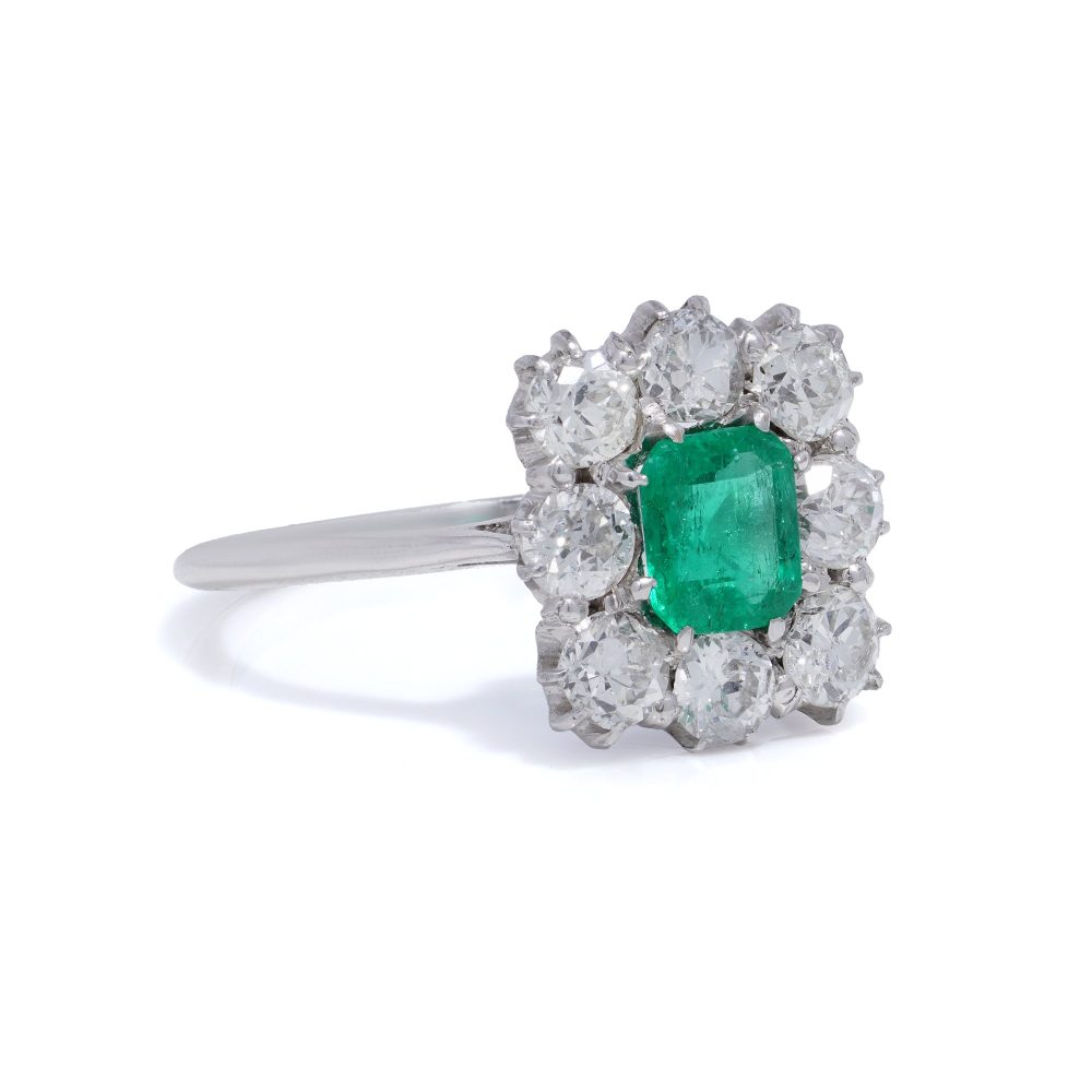 Engagement emerald and diamond ring cluster square