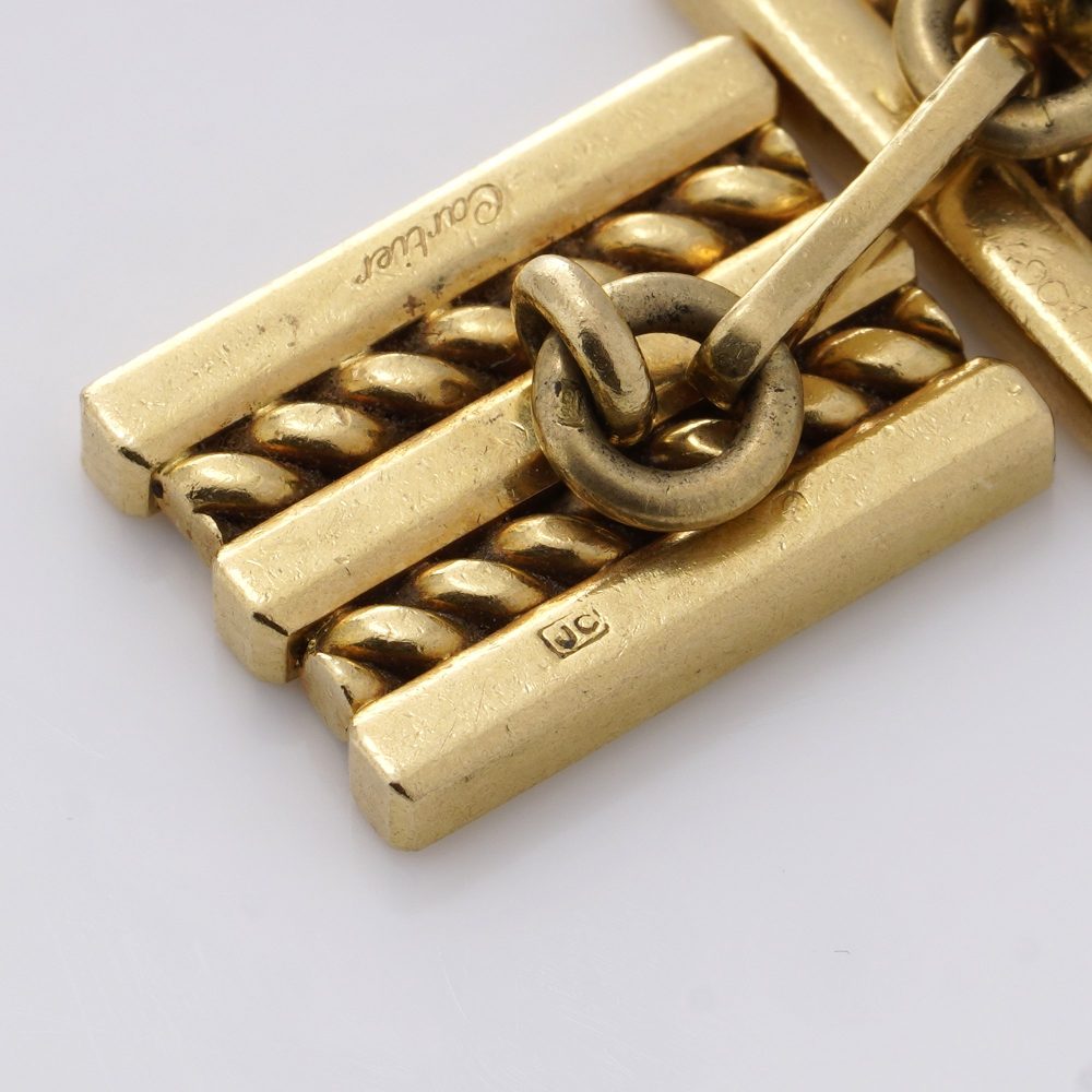 Vintage Cartier 18ct Yellow Gold Geometric Pattern Cufflinks, with clean lines and geometric shapes in a rope-like pattern. Circa 1970s - 1980s