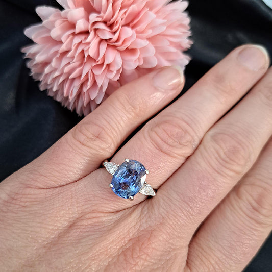 4.80ct Oval Sri Lanka Sapphire and Pear Cut Diamond Trilogy Three Stone Engagement Ring in platinum