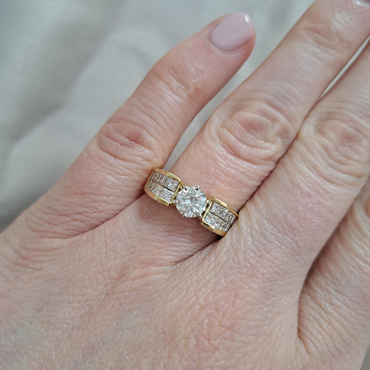 Vintage 0.65ct Diamond Solitaire Engagement Ring with Princess Diamond Shoulders