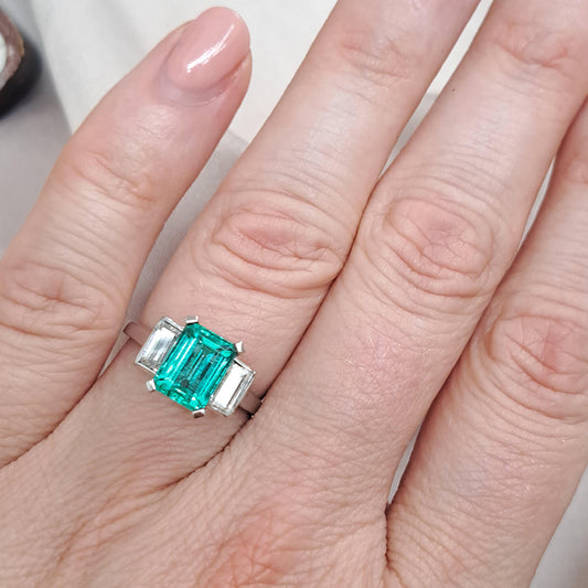 Colombian Emerald and Baguette Diamond Three Stone Engagement Ring in Platinum