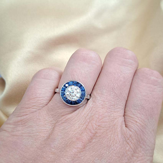 1.21ct Diamond and Calibre Sapphire Target Engagement Ring