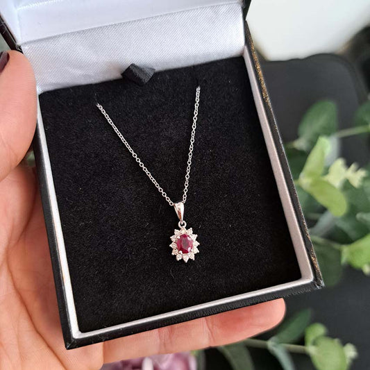0.62ct Oval Ruby and Diamond Cluster Pendant with Chain
