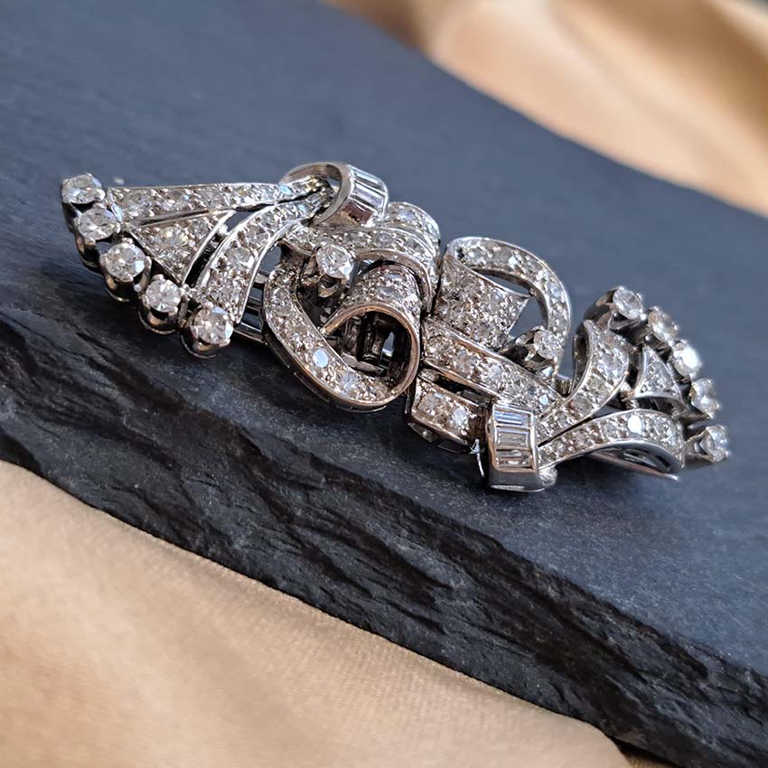 Art Deco 2.4ct Diamond Double Clip Brooch, geometric scrolled design set with 2.40 carats of single-cut, eight-cut and baguette-cut diamonds in platinum to later 14ct white gold pin