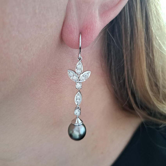 Grey Pearl and Diamond Drop Earrings, grey pearls with silver undertones suspended from diamond drops to diamond-set fleur-de-lis tops in 18ct white gold