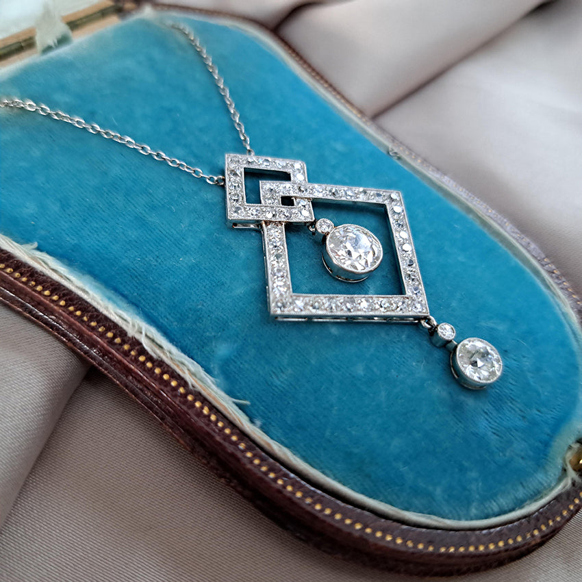 Art Deco 3.5ct Old Cut Diamond Pendant in Platinum, 3.50 carats of old European transitional cut diamonds set in entwined oblique squares. Circa 1920s