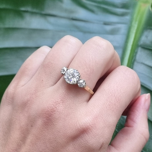 Art Deco French 1.81ct Old Cut Diamond Three Stone Engagement Ring, central 1.81ct F/G VS1 diamond flanked by smaller diamonds in platinum to 18ct yellow gold band