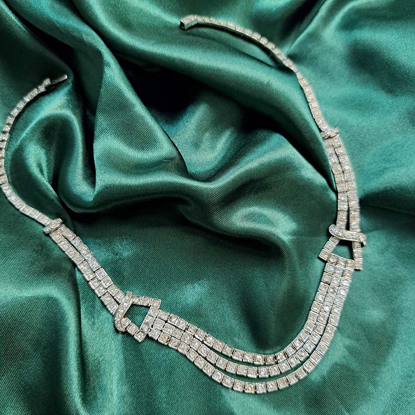 Antique Art Deco 7.64ct Diamond Collar Necklace in Platinum, single-cut and eight-cut diamonds in individual square articulated settings with central three row section graduated to a two row and single row of diamonds with geometric buckle shaped link sections