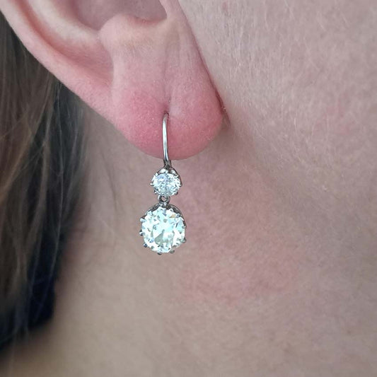 Antique 4.5ct Old Mine Cut Diamond Drop Earrings, sparkling old mine-cut diamond drops suspended from smaller old-cut diamond tops in platinum and 18ct gold