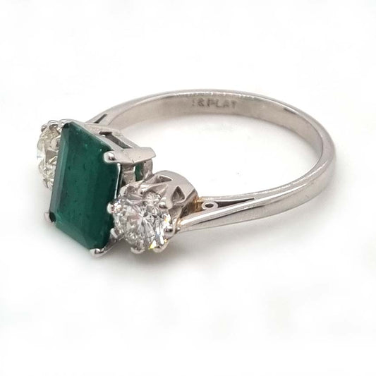 Emerald Cut Emerald and Diamond Three Stone Ring in 18ct White Gold