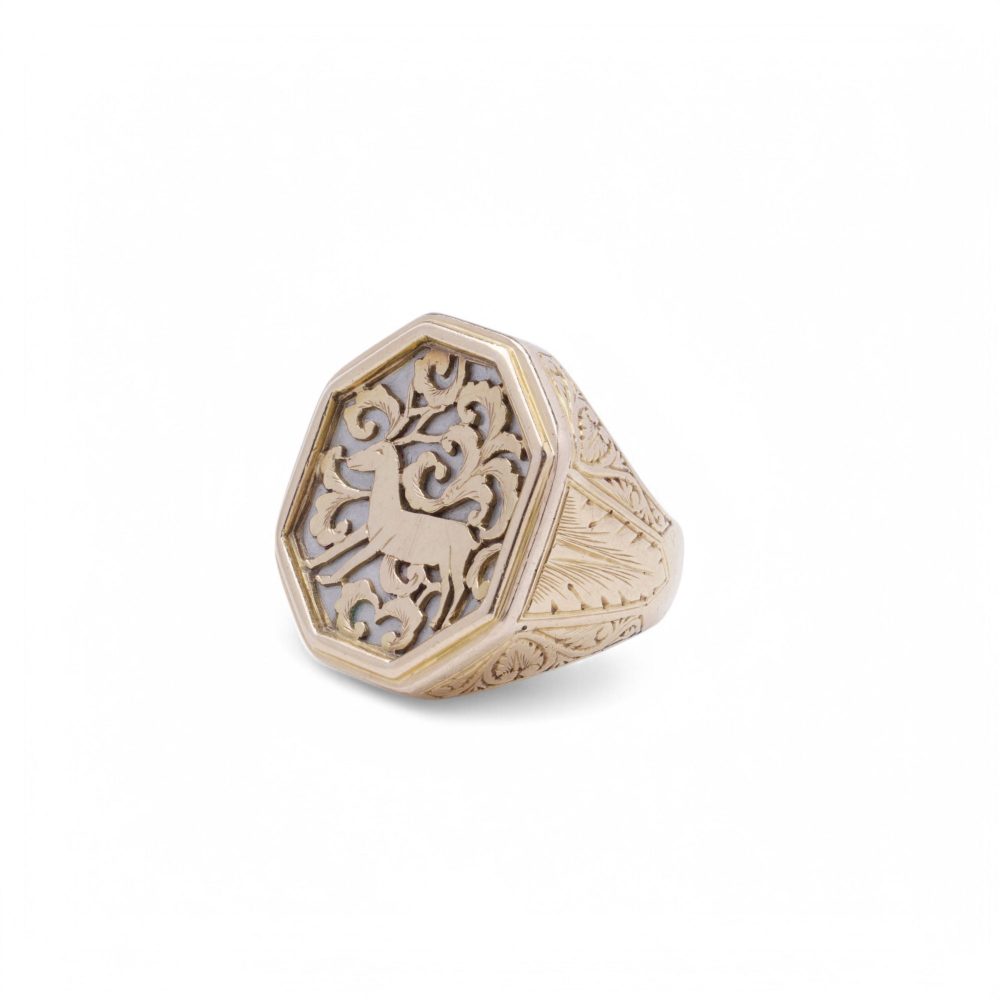 Gold stag signet ring.