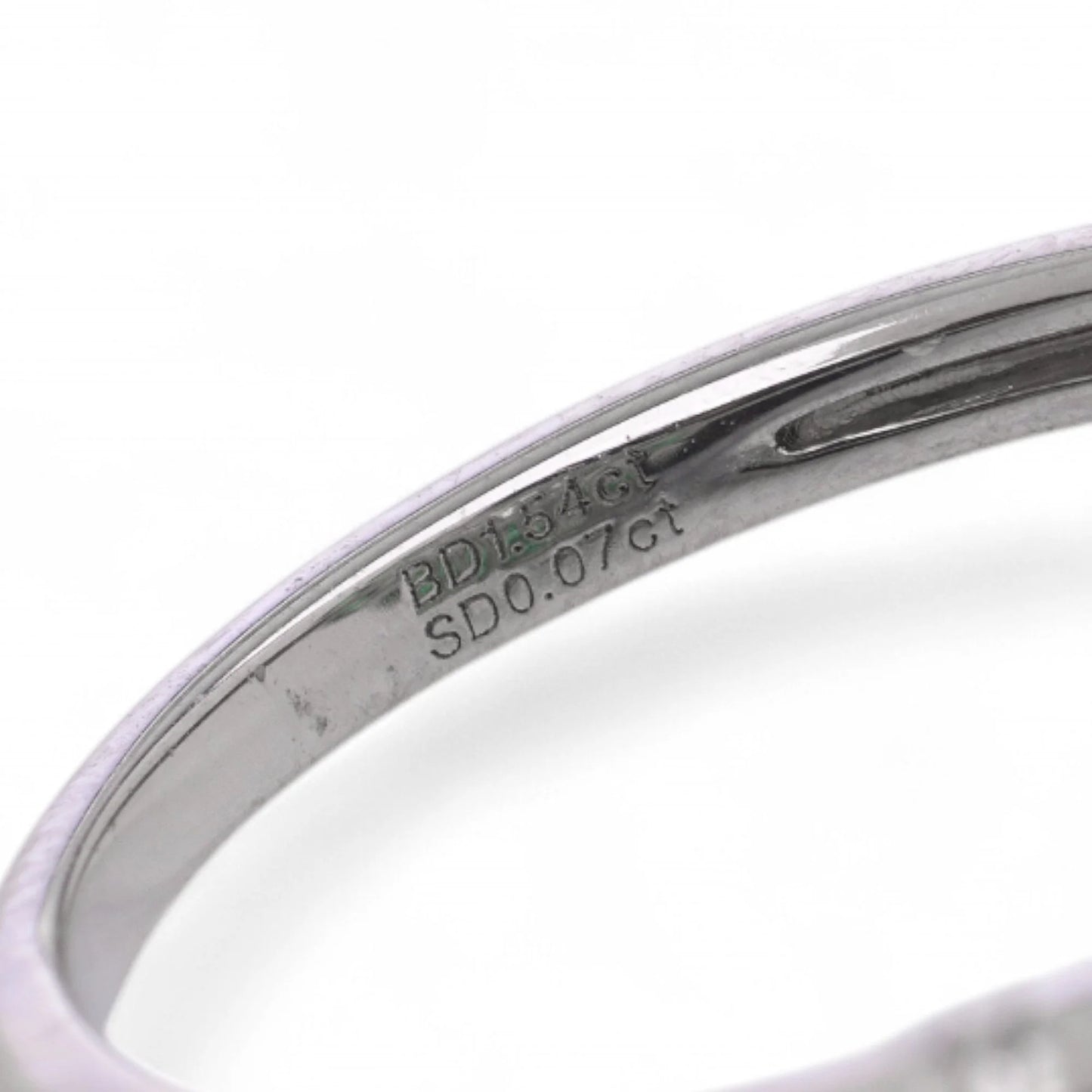 Contemporary Diamond and Emerald Flower Cluster Engagement Ring in Platinum