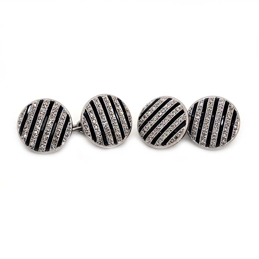 Antique Black Onyx and Diamond Cufflinks, composed of alternating lines of black onyx and sparkling rose-cut diamonds in 18ct white gold