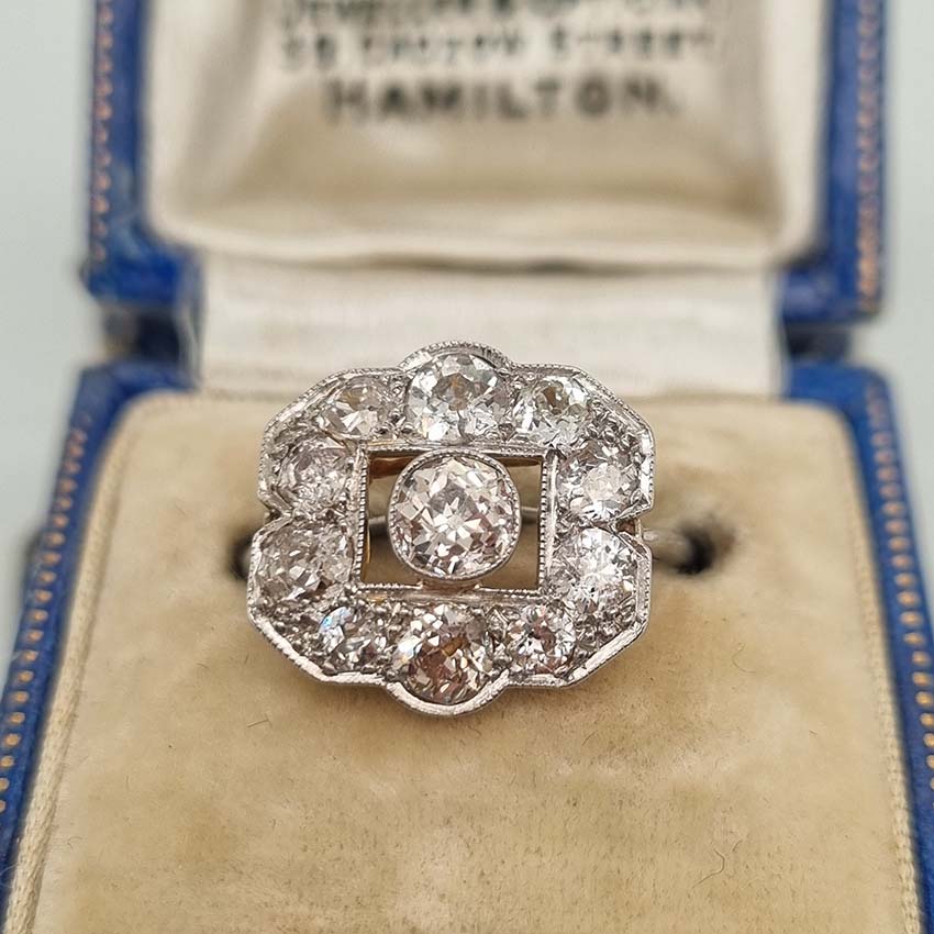 Art Deco 1.5ct Old Cut Diamond Cluster Panel Ring, set with an estimated 1.5 carats of old mine-cut diamonds in 18ct yellow gold to 18ct white gold band