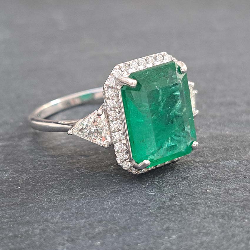 3.85ct Emerald and Diamond Cluster Ring with Trillion Diamond Sides