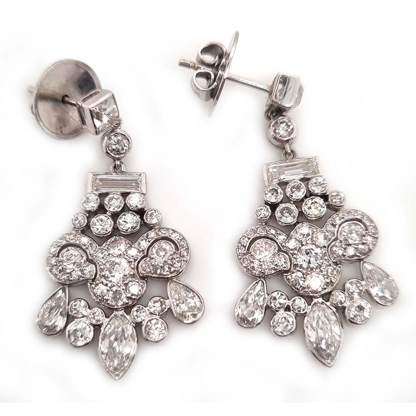 Belle Epoque Antique 2.30ct Diamond Chandelier Drop Earrings, French cut diamond tops suspend graduating fans of baguette, old cut round, marquise and pear cut diamonds, with central stylised leaf giardiniera design in platinum