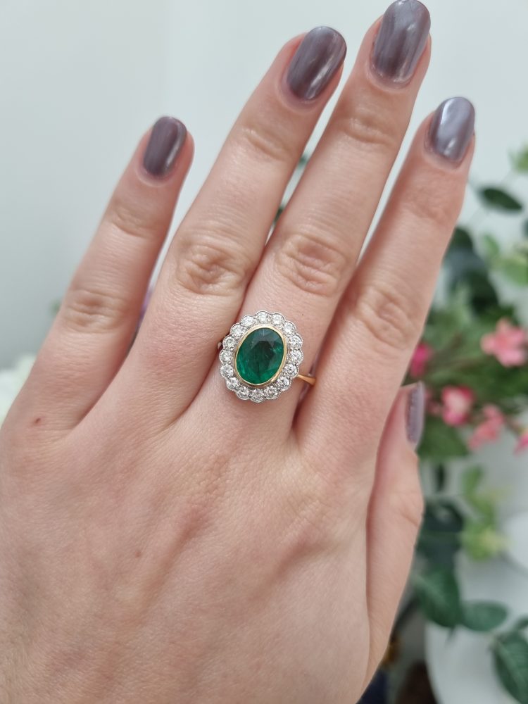 2.25ct Oval Emerald and Diamond Cluster Engagement Ring in 18ct Yellow Gold
