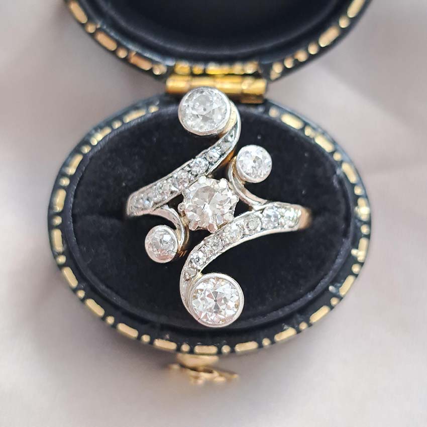 Victorian Antique Old Cut Diamond Ring, central old cut diamond set within curved diamond-set shoulders with larger diamond accents