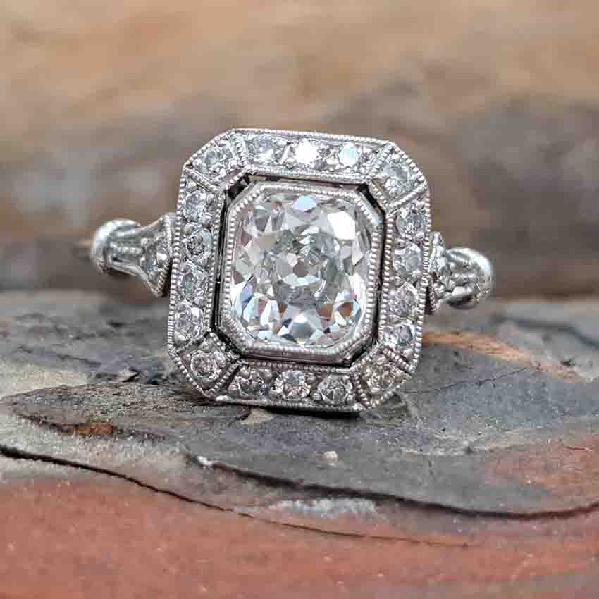 Vintage 1ct Cushion Shape Old Mine Cut Diamond Cluster Engagement Ring in Platinum