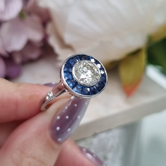 1.21ct Diamond and Calibre Sapphire Target Engagement Ring
