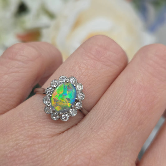 Edwardian Antique Black Opal and Old Cut Diamond Cluster Engagement Ring in Platinum
