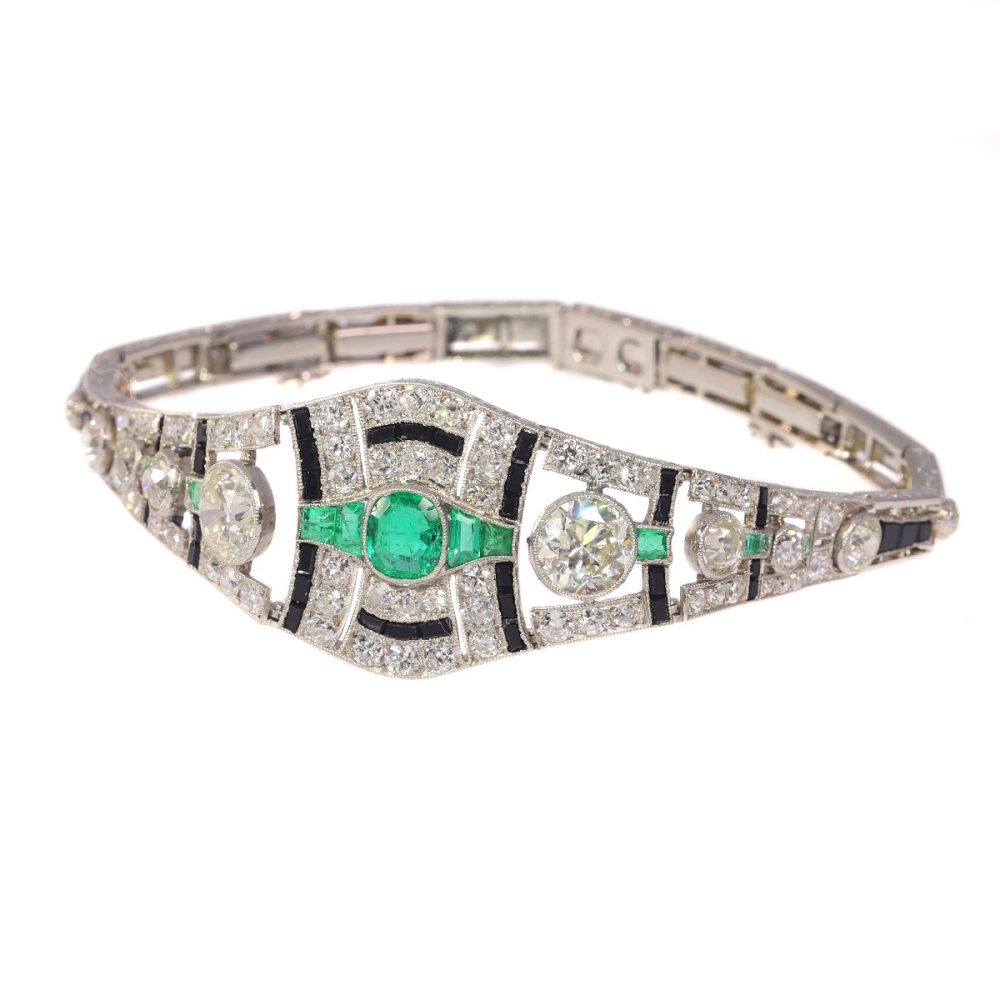 Vintage Art Deco 6.93 Carat Old Cut Diamond, Onyx And Emerald Bracelet In Platinum