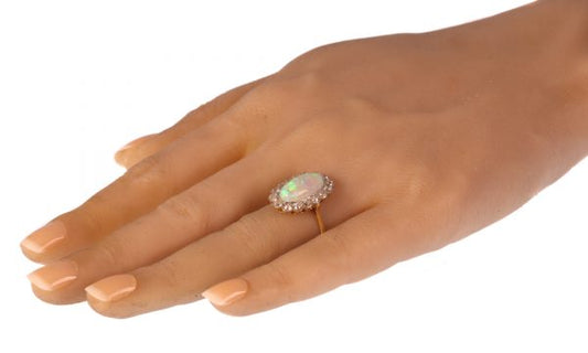 Antique Art Deco cabochon opal and diamond engagement ring