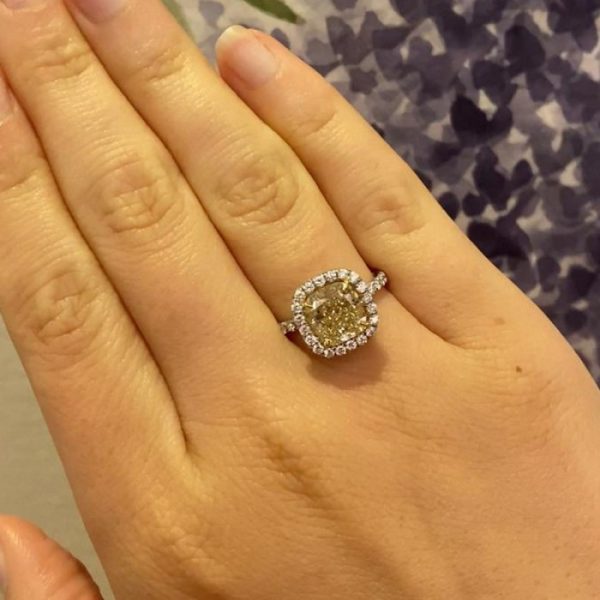 3.00ct Cushion Cut Yellow Diamond Cluster Ring; a 3.00 carat cushion-cut light yellow diamond, with 1.50ct diamond surround, 18ct gold